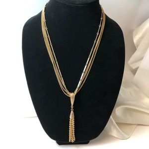 Tassel gold tone necklace